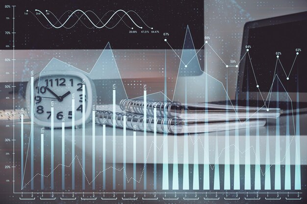 Holograma de gráfico de divisas en la mesa con fondo informático Doble exposición Concepto de mercados financieros
