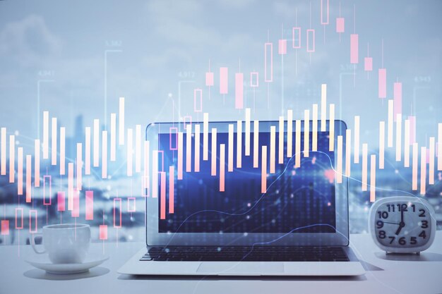 Holograma gráfico de divisas en la mesa con fondo informático Múltiple exposición Concepto de los mercados financieros