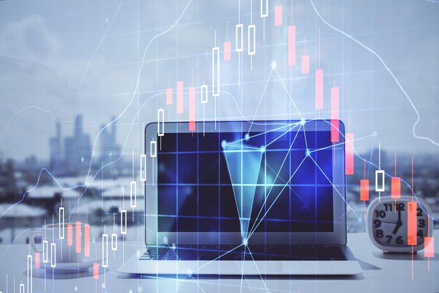 Holograma gráfico de divisas en la mesa con fondo informático Múltiple exposición Concepto de los mercados financieros