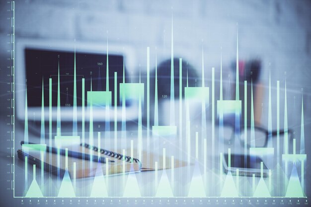 Holograma de gráfico de divisas en la mesa con fondo informático Múltiple exposición Concepto de mercados financieros