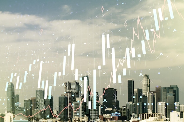 Holograma de gráfico financiero virtual abstracto en el fondo del paisaje urbano de Los Ángeles concepto financiero y comercial Multiexposición