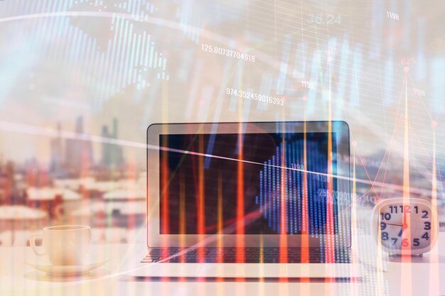 Holograma gráfico de forex en la mesa con fondo de computadora Concepto de exposición múltiple de los mercados financieros