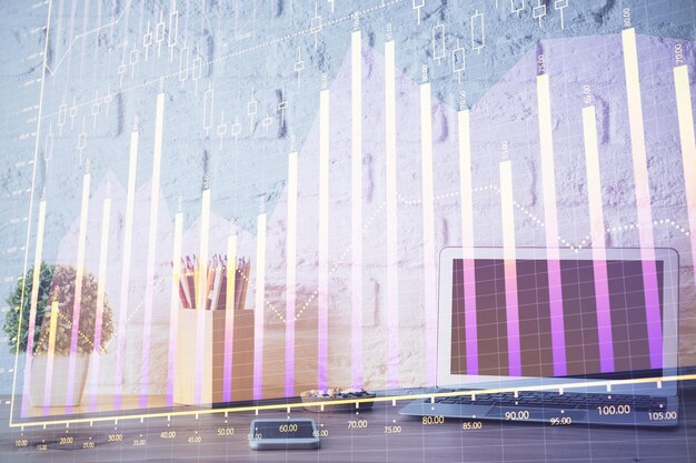 Holograma del gráfico del mercado de divisas y computadora personal en el fondo Doble exposición Concepto de inversión