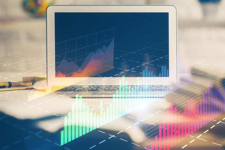 Foto holograma del gráfico del mercado de divisas y computadora personal en el fondo doble exposición concepto de inversión