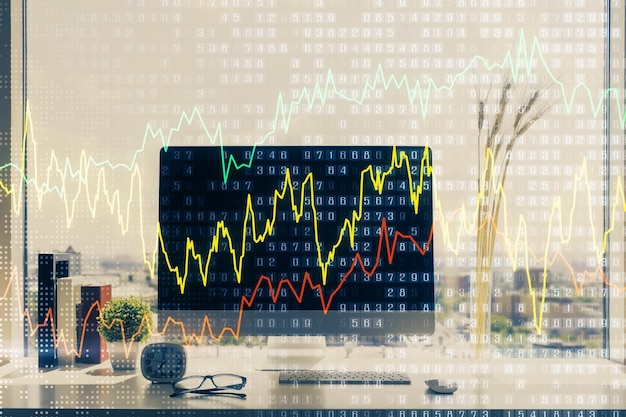 Holograma de gráfico de mercado de divisas y computadora personal en el fondo Exposición múltiple Concepto de inversión