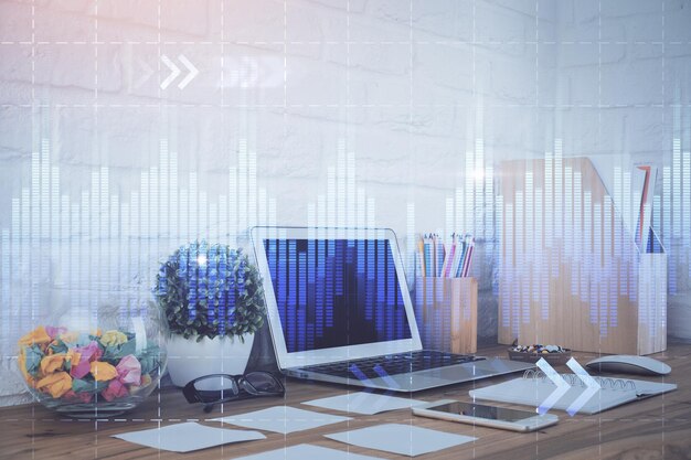 Holograma del gráfico del mercado de divisas y computadora personal en el fondo Exposición múltiple Concepto de inversión