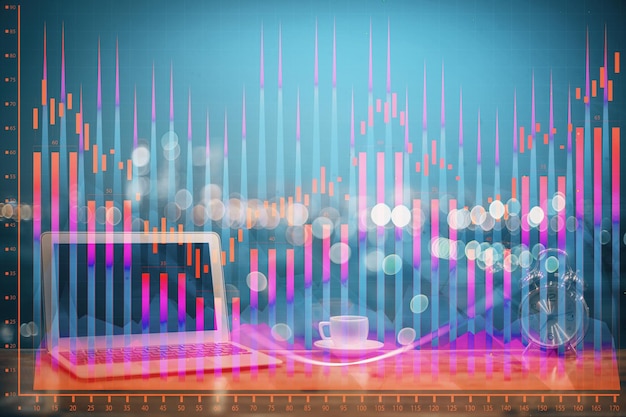 Holograma de gráfico de mercado de divisas y computadora personal en el fondo Exposición múltiple Concepto de inversión