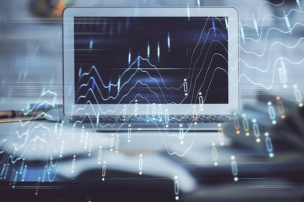 Holograma de gráfico de mercado de divisas y fondo de computadora personal Exposición múltiple Concepto de inversión