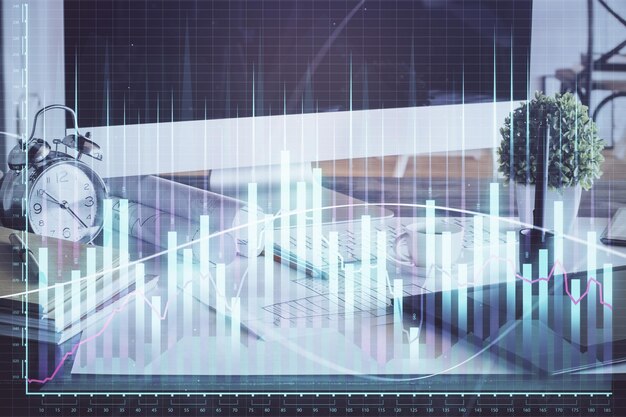 Holograma de gráfico de mercado de divisas y fondo de computadora personal Exposición múltiple Concepto de inversión