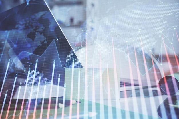 Holograma de gráfico de mercado de divisas y fondo de computadora personal Exposición múltiple Concepto de inversión