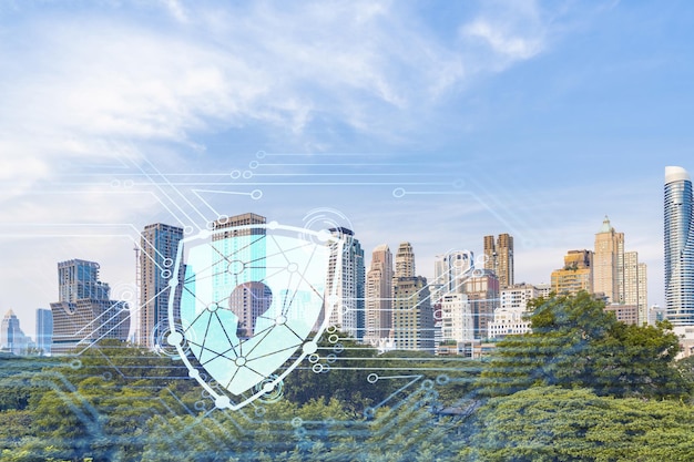 Foto holograma del icono del candado sobre la vista panorámica de la ciudad de bangkok para proteger los negocios en el sudeste asiático el concepto de escudos de seguridad de la información doble exposición