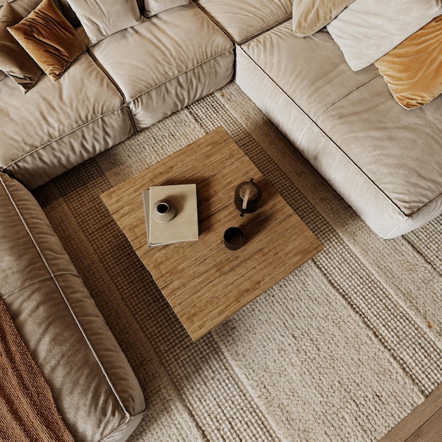 Holz-Coffee-Tisch mit Geschirr und Büchern Sofa Kissen Teppich im zeitgenössischen Loft Interieur Top-View