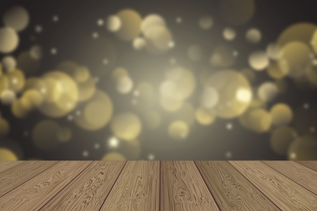 Holztisch mit Weihnachtsbokeh-Lichterhintergrund