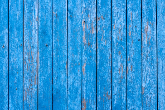 Holzwand mit vertikalen Brettern. alte blaue Farbe. Hintergrund für Designer. Foto in hoher Qualität