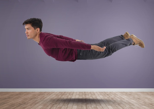 Foto hombre flotando en la habitación