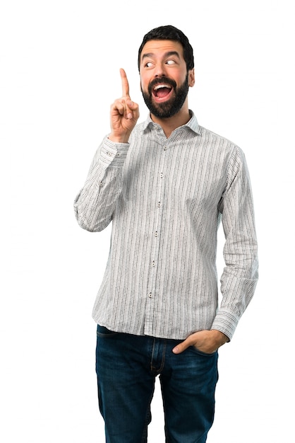 Foto hombre guapo con barba con la intención de darse cuenta de la solución