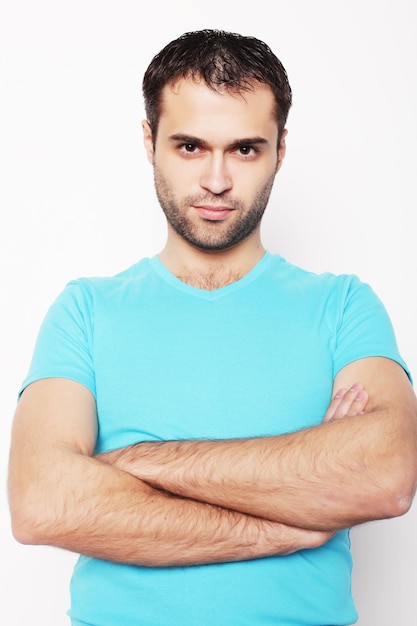 Foto hombre guapo en camisa azul