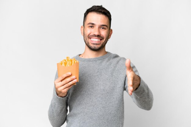 Hombre guapo joven sobre fondo aislado