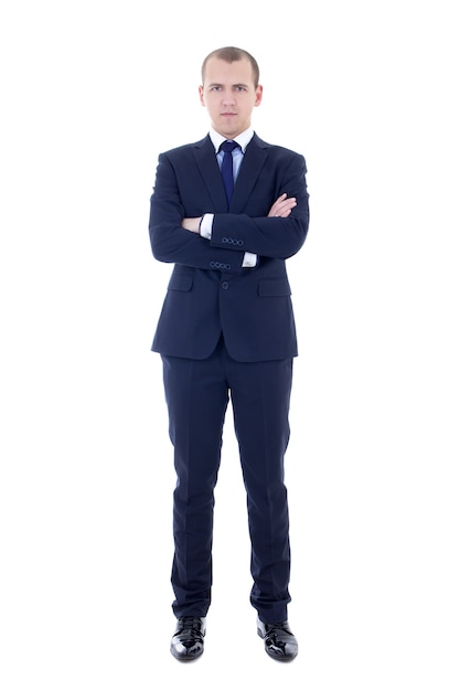 Hombre guapo joven en traje de negocios aislado sobre fondo blanco.