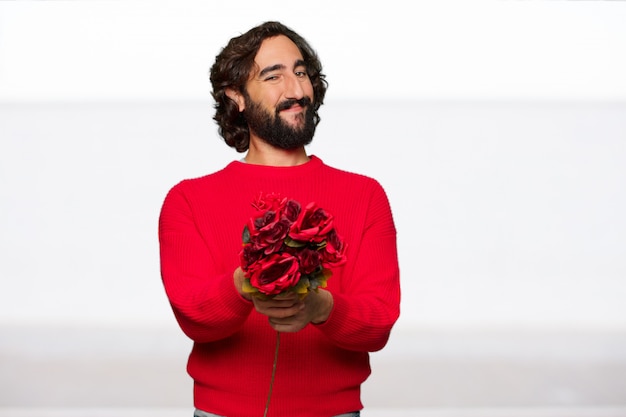 Hombre loco joven en el amor, concepto del día de tarjeta del día de San Valentín.