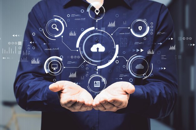 Hombre con las manos sosteniendo una interfaz de negocios abstracta en un fondo borroso Tecnología de computación en la nube y concepto de base de datos Doble exposición