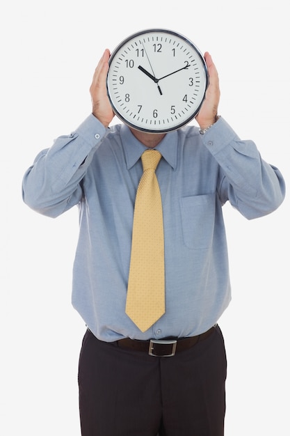 Hombre de negocios con cara de reloj