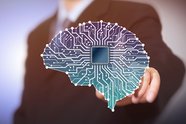 Hombre de negocios con cerebro de inteligencia artificial se conecta al concepto de red de tecnología.