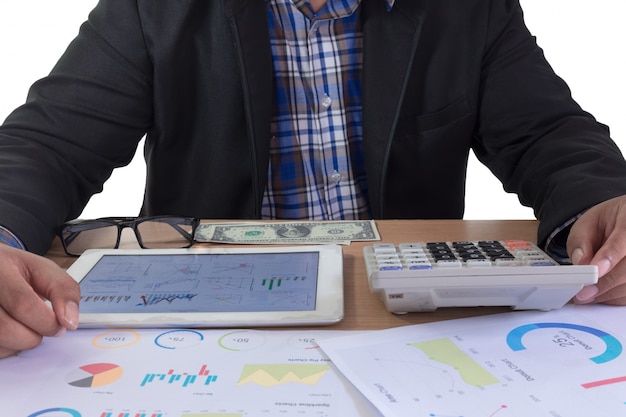 Foto hombre de negocios con la computadora portátil del teléfono móvil del cuaderno en la oficina en casa