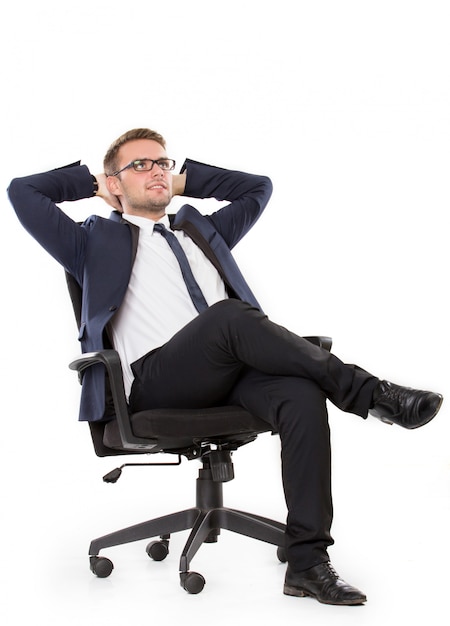 Hombre de negocios pensando en una silla
