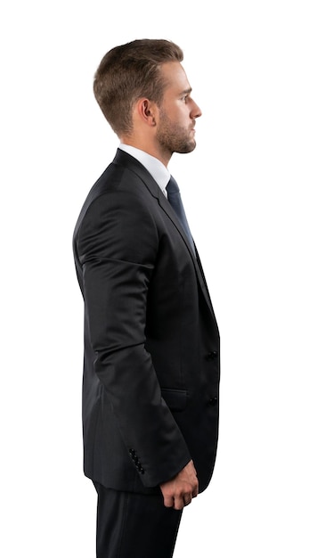 hombre de negocios, en, traje negro, vista lateral, posición, aislado, encima, fondo blanco