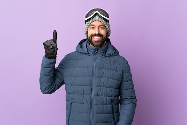 Hombre en ropa de invierno en estudio