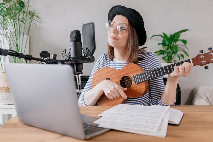Foto hombre sentado en la guitarra
