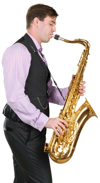 Foto hombre tocando un saxofón