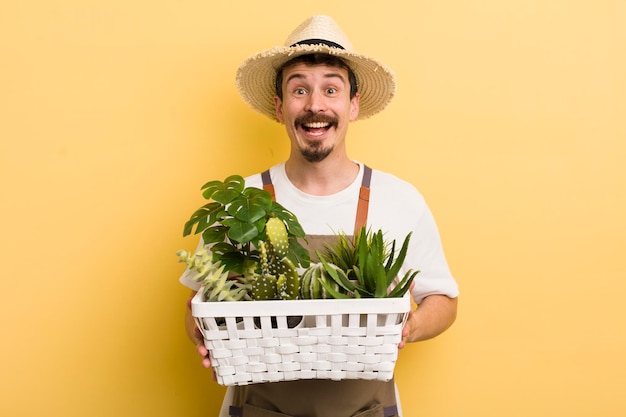 Homem bonito cuidando de plantas