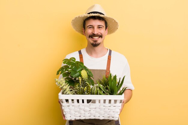 Homem bonito cuidando de plantas