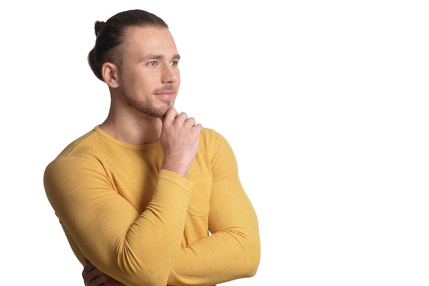 Homem bonito posando isolado no fundo branco