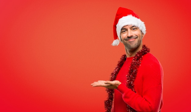 Homem, com, roupas vermelhas, celebrando, a, natal, feriados, apresentando, um, idéia