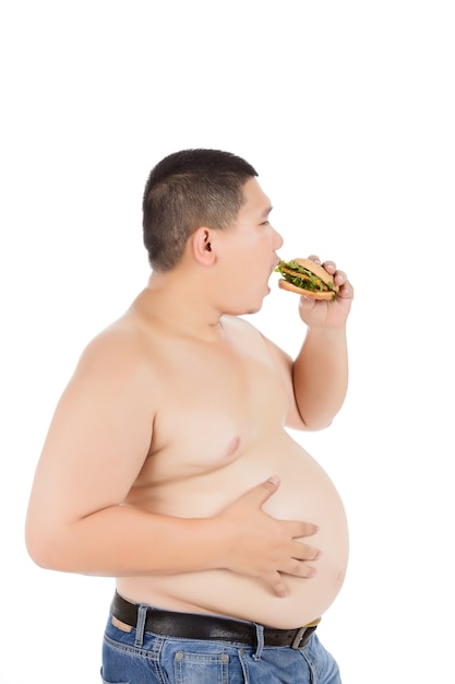 Homem gordo comendo junk food