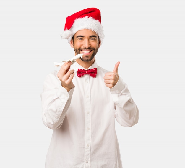 Foto homem jovem, desgastar, um, papai noel, chapéu, ligado, dia natal