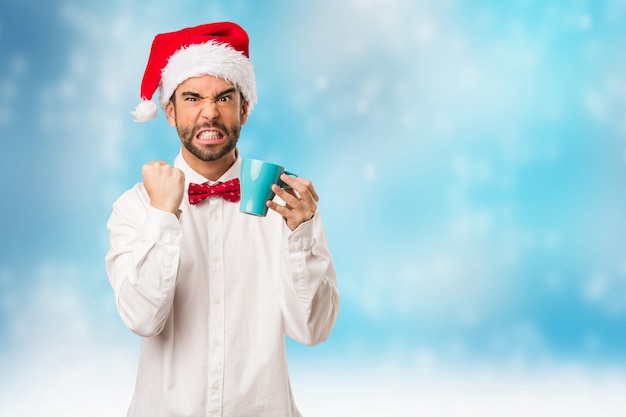 Homem jovem, desgastar, um, papai noel, chapéu, ligado, dia natal