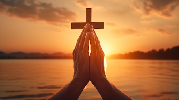 Foto homem mãos para cima rezando e adorando a cruz