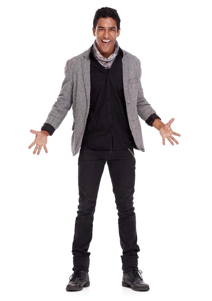 Foto homem moda e casaco para retrato de estúdio com sorriso emocionado confiança ou wow para palma aberta por fundo branco pessoa modelo e estilo de moda com blazer para choque surpresa ou feliz com as mãos
