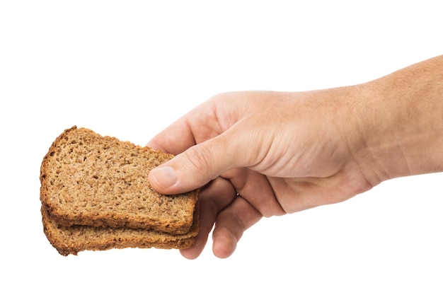 Homem segura na mão dois pedaços de pão isolados no fundo branco, modelo para o designer