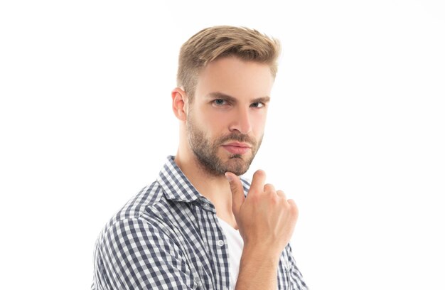 Homem sem barba carismático em camisa quadriculada homem sem barba foto de estúdio de cuidados com a pele de homem sem barba