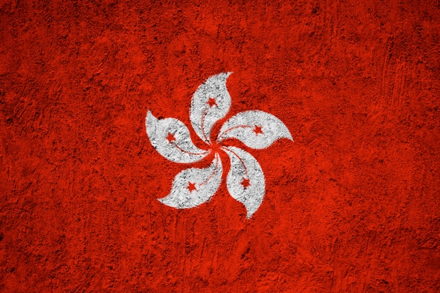 Foto hong kong-flagge gemalt auf schmutzwand