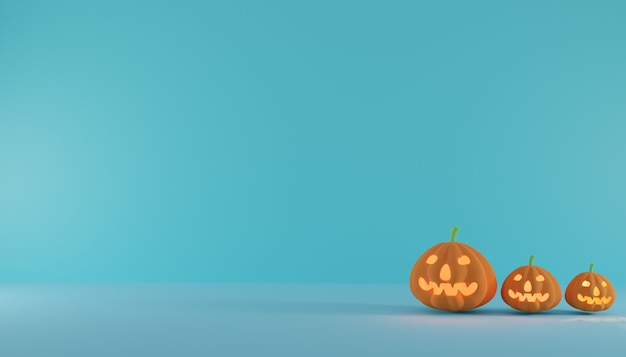 Horizontales Halloween-Banner oder -Plakat mit drei Halloween-Kürbissen auf azurblauem Wandhintergrund.
