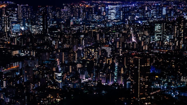 Horizonte urbano moderno do Japão à noite com vista para a bela cidade de Tóquio Vista aérea sobre a paisagem urbana Conceito de finanças e economia de negócios