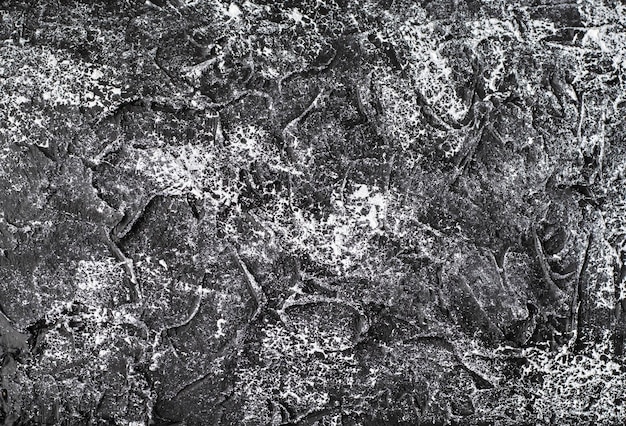 Hormigón negro con un patrón de cemento o yeso blanco Fondo gris oscuro o textura de pizarra negra