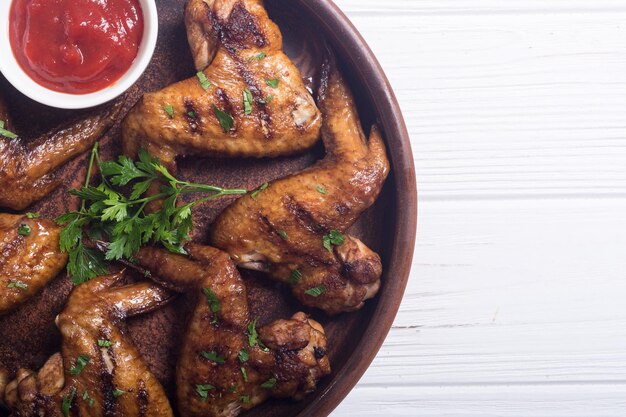 Hot Bbq Alitas de pollo a la parrilla con salsa de tomate Comida a la parrilla