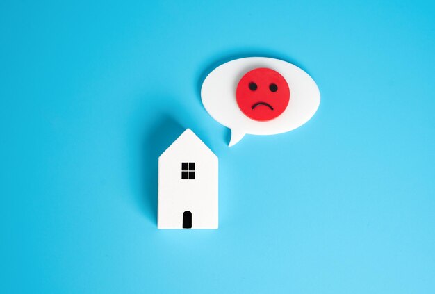 A house expressing negative emotions Old housing needs repair Low demand for housing
